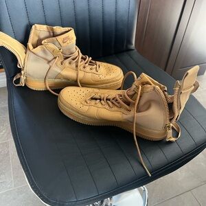 Nike women’s Brown High-Top Sneakers